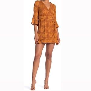 Kenedik Ruffle Wrap Dress